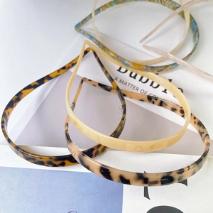 Slim acetate non-slip headbands in tortoiseshell and beige styles for women