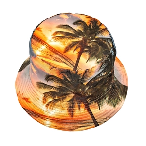 Detail of tropical sunset print on bucket hat showing palm trees and reinforced stitching