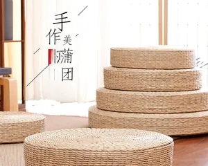 Detail showing various sizes of stacked handmade straw woven tatami floor cushions