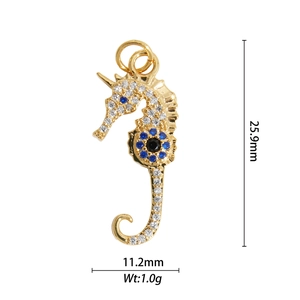 Detailed seahorse pendant in 18K gold plating with blue and white zircon stones