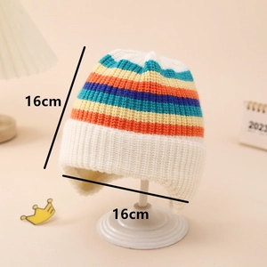 Detailed view of rainbow striped knit baby hat with ear flaps and 16cm dimensions