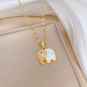 Luxurious gold elephant necklace with white shell inlay and sparkling crystals