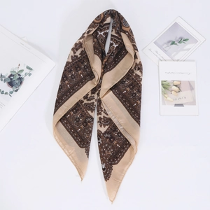 Flat lay detail of a 70cm vintage paisley cotton linen scarf with Nordic aesthetic cards
