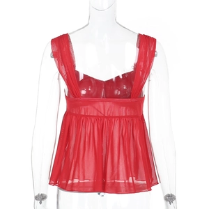 Detail of red mesh lace camisole top featuring V-neckline and ruffled peplum hemline