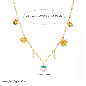 Charming pearl necklace featuring colorful sun flower, strawberry, and lucky clover charms