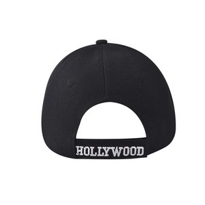 Detail of black cotton baseball cap back with white Hollywood embroidered strap