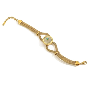 Gold braided stainless steel mesh bracelet with cat-eye stone and turquoise inlay