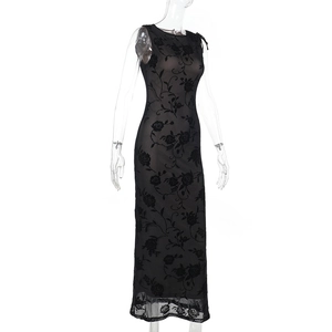 Detail of rose flocking pattern and mesh stitching on black sleeveless maxi dress