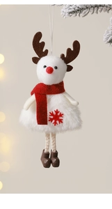 Close-up of plush reindeer Christmas ornament with red scarf and snowflake details
