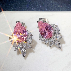 Detailed view of pear-cut pink gemstone earrings with marquise zircon stones