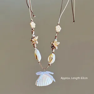 Detail of starfish and seashell pendant on brown woven cord, length approx. 63cm