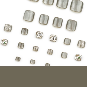 Cat eye and rhinestone glitter press-on toenails set in grey and silver finishes