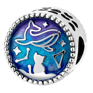 Detail of silver bead charm with blue-purple enamel whale cat and stars patterns