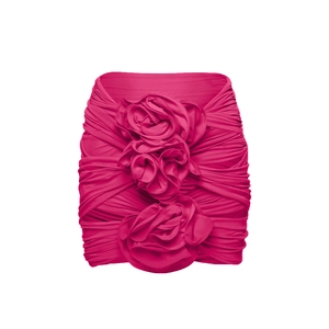 Detail of hot pink one-piece swimwear with three large 3D floral decorations and ruched fabric