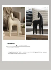 Detail of matte finish and minimalist horse statues in black and white resin
