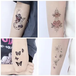 Waterproof butterfly and floral temporary tattoo stickers set shown on arm skin