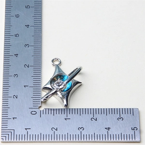 Silver star pendant with blue sky inlay and zircon, shown with scale for 1.5cm size
