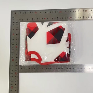 Detailed size measurement of a red and black printed Christmas tree skirt in packaging