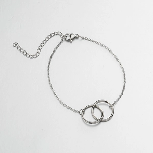 Minimalist 18K gold stainless steel bracelet with interlocking rings and lobster clasp