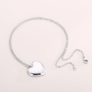 Minimalist silver heart pendant necklace on an O-chain made of durable stainless steel