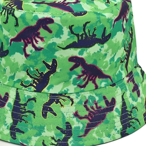 Close-up of durable canvas bucket hat featuring camouflage dinosaur silhouette patterns
