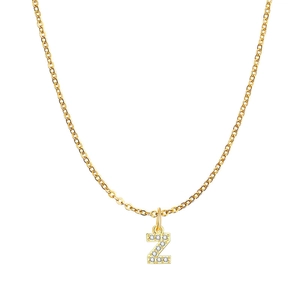 Macro view of dainty gold necklace with a micro-paved Z-letter pendant featuring zircons