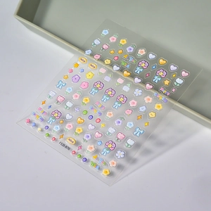 Autocollants 3D pour ongles avec motifs floraux, cœurs et nœuds papillon sur fond transparent