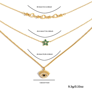 Collana a tre strati in acciaio al titanio dorato con ciondoli stella, cuore e occhio