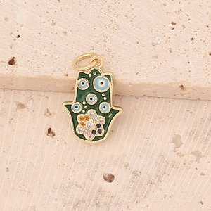 Vintage gold Hamsa hand necklace with green enamel, evil eyes and colorful zircons