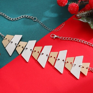 Detail of festive gold and silver trapezoid necklace with textured finish and lobster clasp