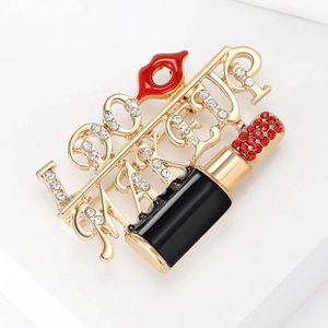 Fashionable lipstick and red lips brooch with I LOVE MAKEUP text and sparkly rhinestones