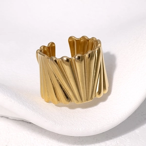 Polished 18k gold plated stainless steel wide ring with architectural vertical stripes
