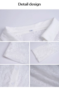 Detail design showing delicate floral lace pattern and button closure on white shirt