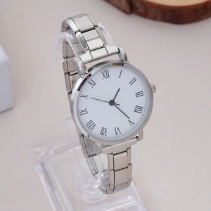 Close-up of elegant silver stainless steel watch with white Roman numeral dial on stand