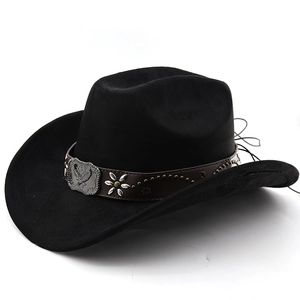 Detail of western cowboy hat with brown leather band and eagle metal buckle decoration