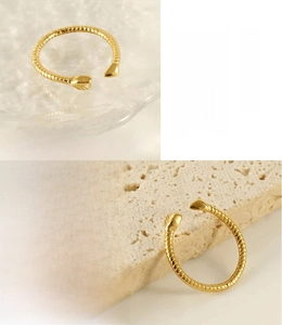 Detail of 18K gold plated snake ring showing vacuum plating and 365-day color retention