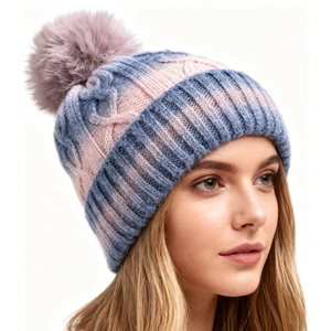 Women's cable-knit winter hat with pink-blue gradient and large faux fur pom-pom