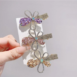 Elegant floral rhinestone hair clips set in lilac, pink and champagne gold colors