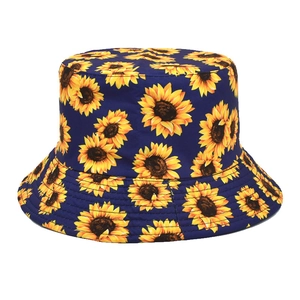 Close-up of navy blue bucket hat with yellow sunflower print and reinforced stitching