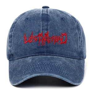Detail of red Lost My Head embroidery on navy washed cotton gothic baseball cap