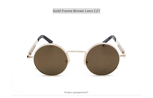 Macro detail of steampunk gold metal spring temples and brown lenses on retro sunglasses