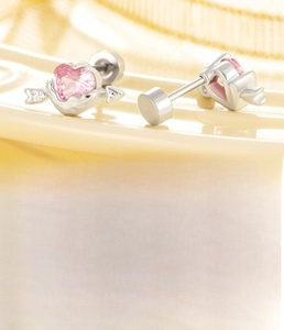 Macro detail of pink heart zircon stud earrings with flat back 4mm screw design