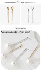 Detail of waterproof gold and silver pearl tassel earrings with zircon stones