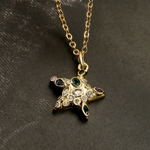 Collana con pendente a stella placcata in oro 18 carati con zirconi multicolore