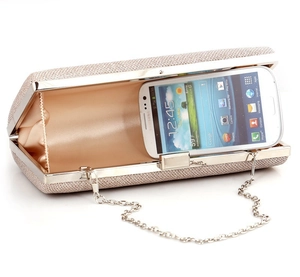 Detail view showing storage capacity of rose gold glitter evening clutch with chain