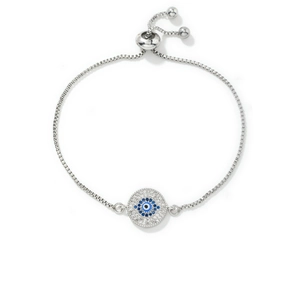 Classic silver evil eye slider bracelet with blue and white zircons on a white background