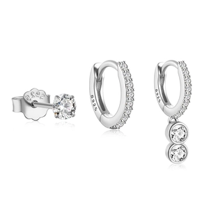 Macro detail of three-piece S925 sterling silver hoop earring set with cubic zirconia
