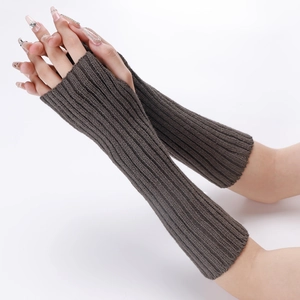 Close-up of deep brown knitted arm warmers with vertical striped texture and fingerless design