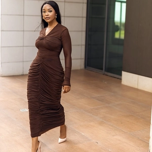 Deep brown V-neck long sleeve bodycon dress with ruched details for a slim silhouette