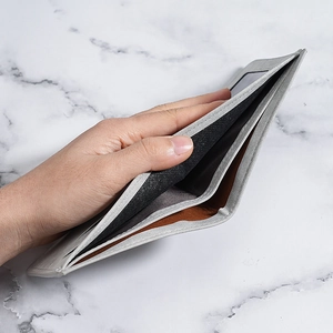 Slim grey matte wallet for men with a thin bi-fold design and multi-card slots